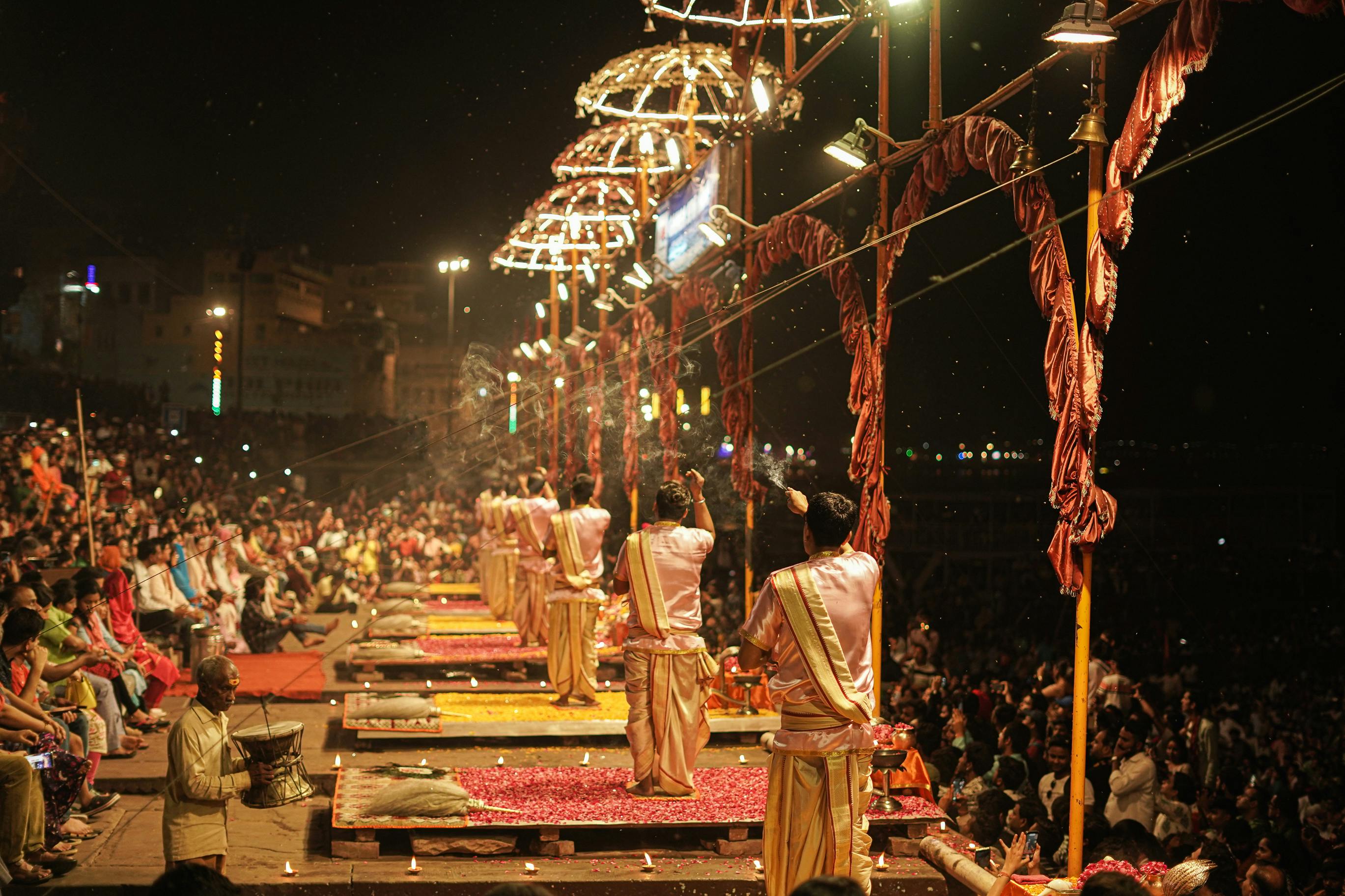 Captivating night scene of the Ganga Aarti ceremony, showcasing the vibrant Indian culture at Varanasi Ghats.