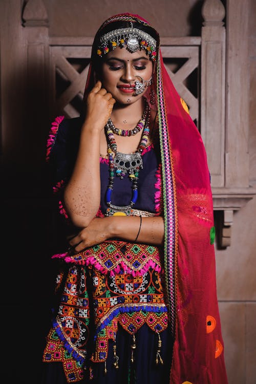 A woman in traditional indian clothing posing for the camera