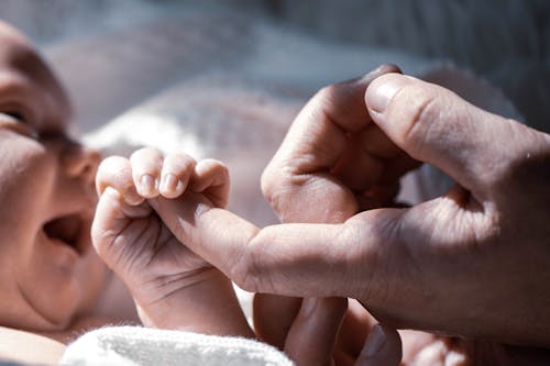 Free Baby and mother connection Stock Photo