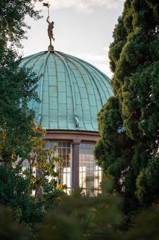 A captivating view of a domed structure surrounded by trees in Karlsruhe, Germany.