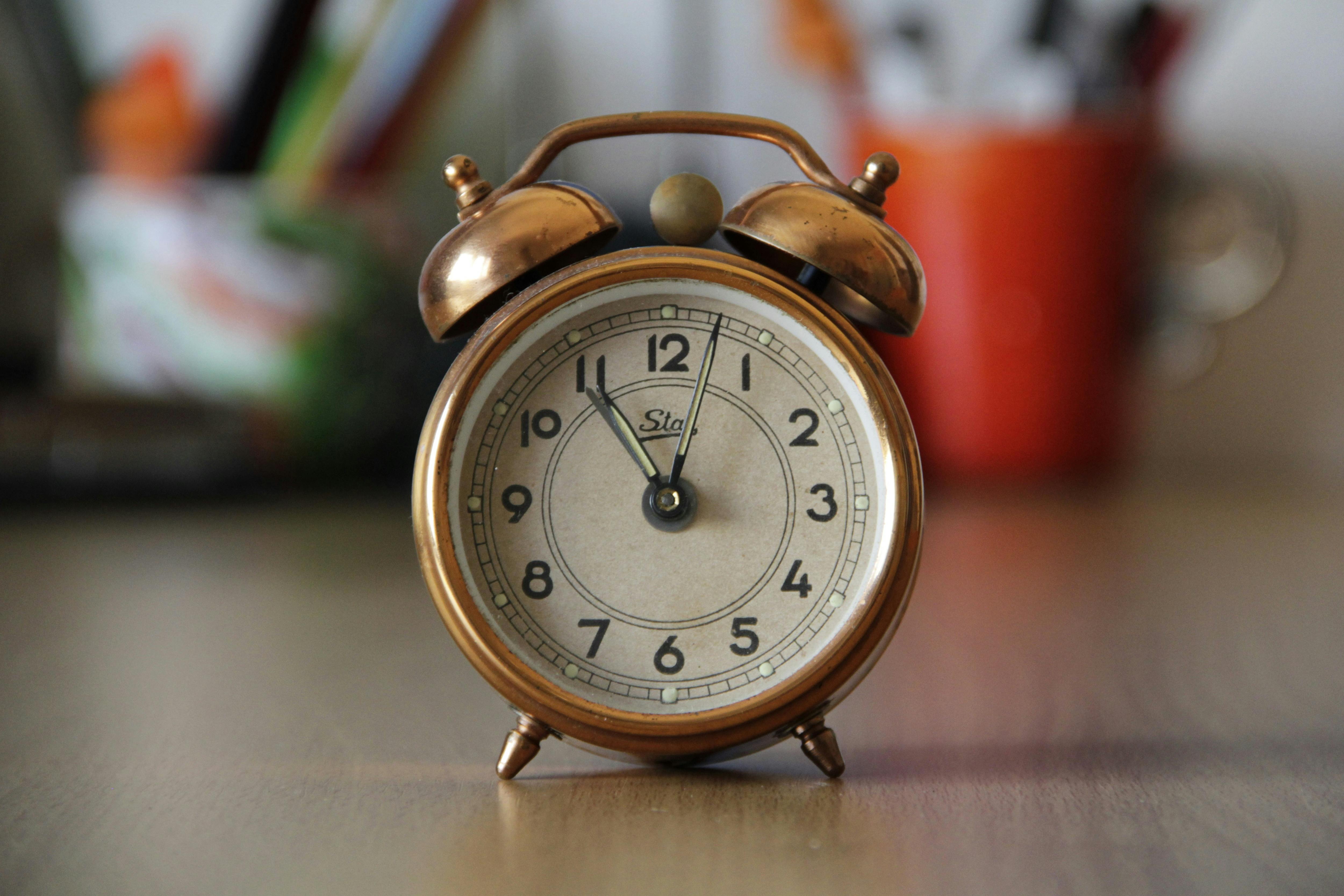 Focus Photography of Brown Double Bell Alarm Clock · Free Stock Photo