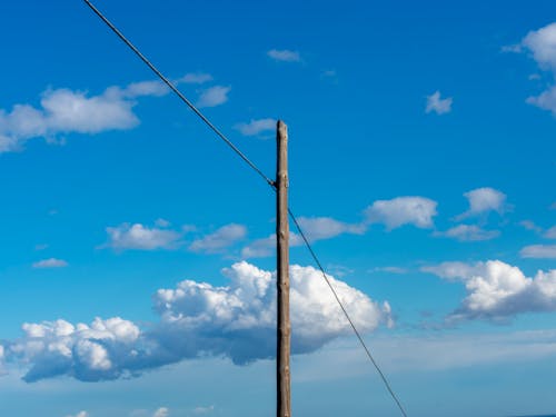 Free stock photo of blue sky, electric pole, white clouds