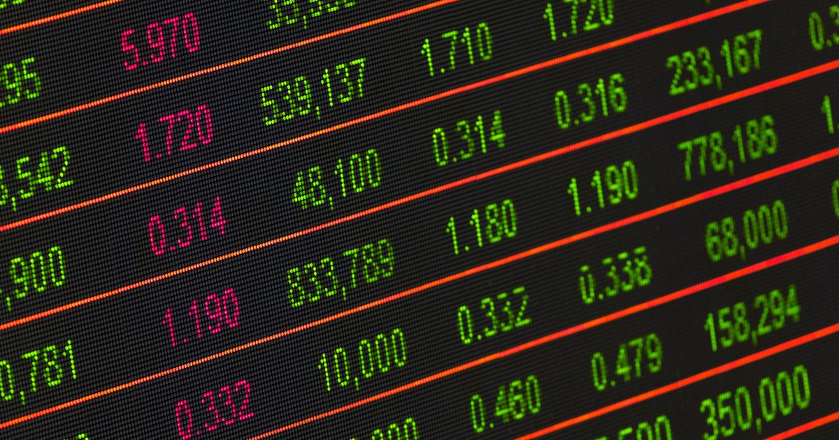 Stock exchange board Fed rate decision Netflix earnings