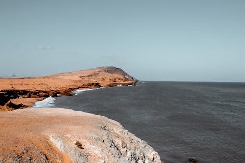 Free Seashore Under Blue Sky Stock Photo