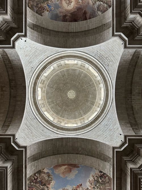 Free A beautifully ornamented dome ceiling inside a historic Catholic cathedral in Madrid. Stock Photo