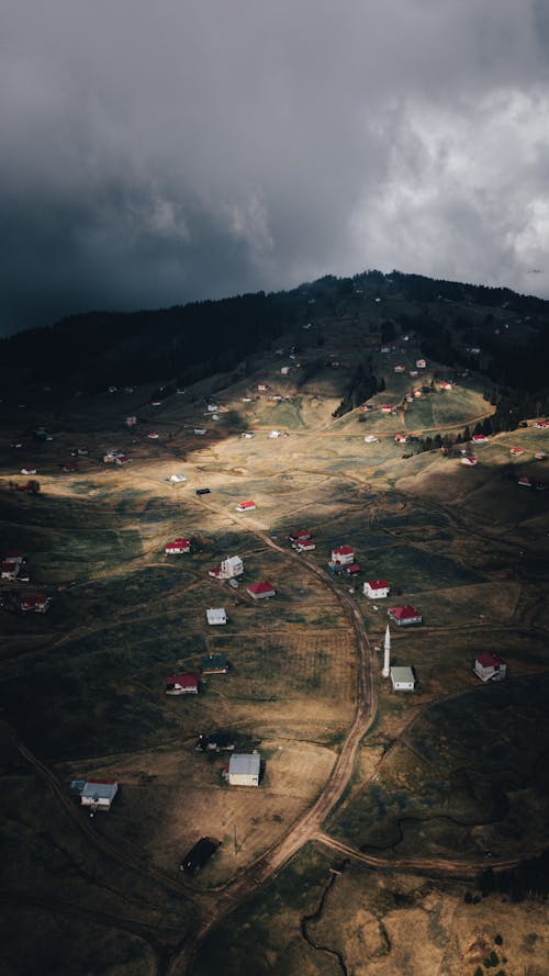 A photo of a small village in the mountains