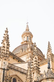 Detailed exterior view of Segovia Cathedral's gothic architecture in Spain.