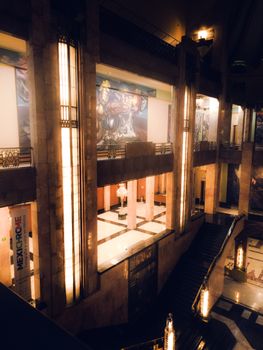 Stunning art deco interior of Palacio de Bellas Artes in Mexico City, showcasing elegant architecture and illuminated artwork