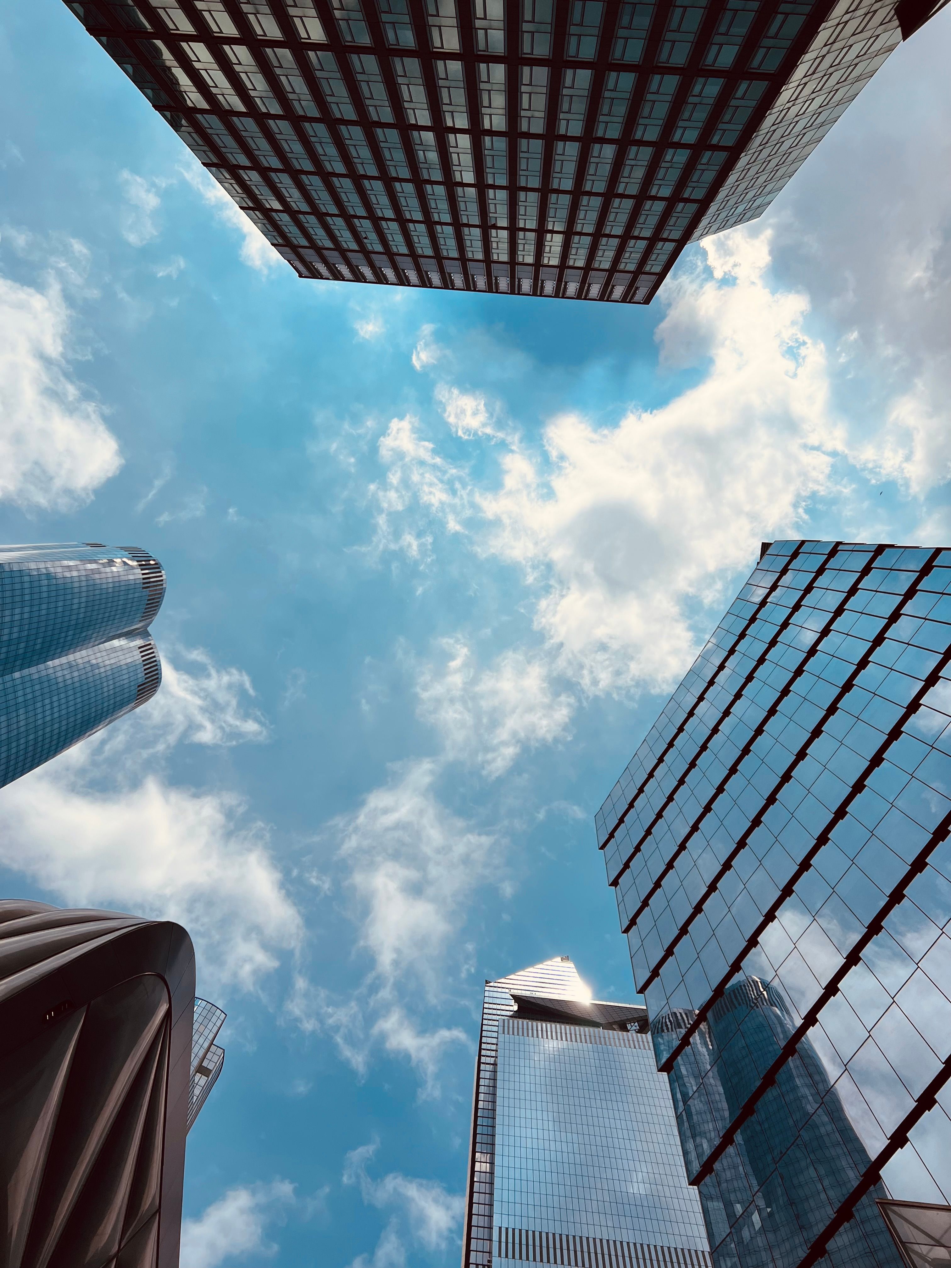 Low Angle Shot of Modern Skyscrapers in a City · Free Stock Photo