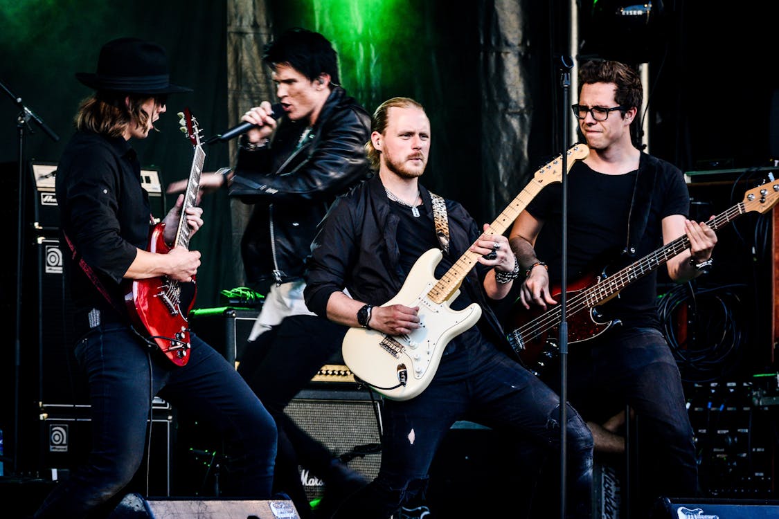 Group of Four Men Rock Band