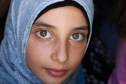 Portrait of Woman Wearing Blue Hijab