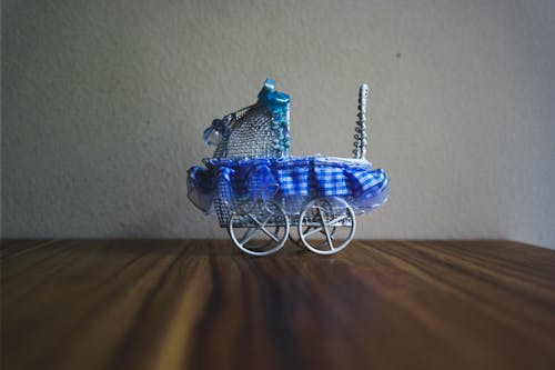 White and Blue Bassinet Table Decor on Table Top