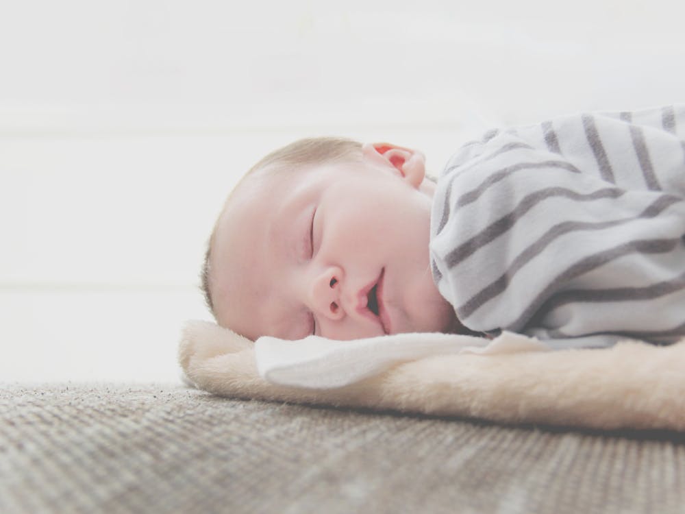 Free Close-Up Photo of Sleeping Baby Stock Photo