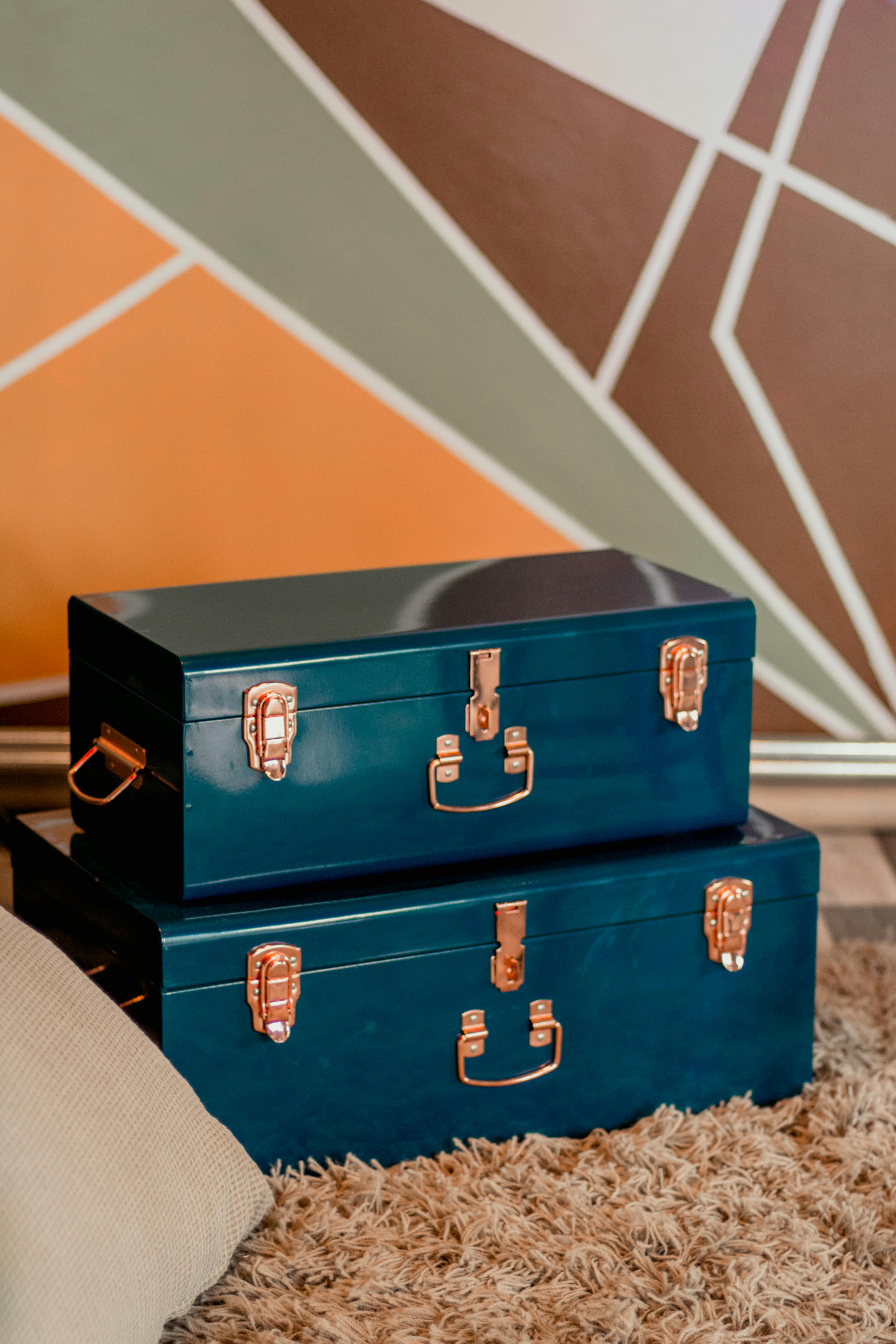 two blue metal storage boxes