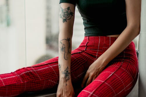 Free Woman Showing Her Tattoos Stock Photo