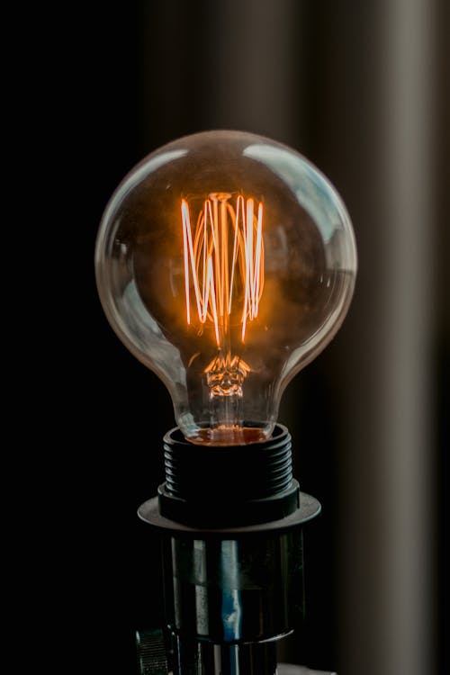 Free Close-up Photo of Lit  Light Bulb Stock Photo