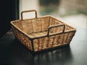 Square Brown Wicker Basket on Table
