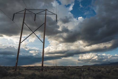 View of Electric Cable Lines Under Cloudy Day