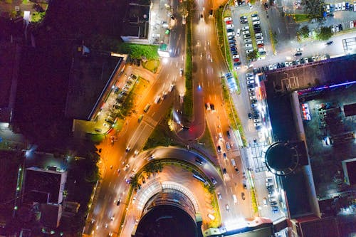 Aerial View of Vehicles on Road at Night