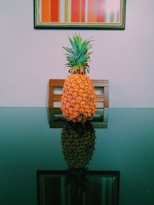 Pineapple on Glass Table