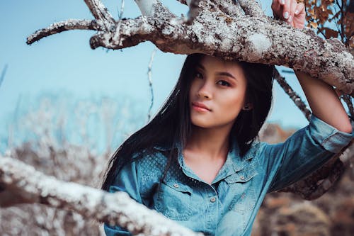 Woman In Blue Denim Dress Shirt