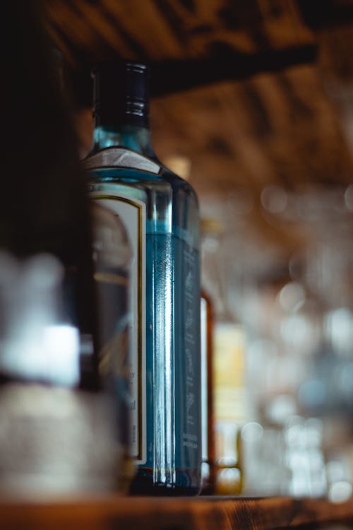 Clear Glass Bottle On Shelf