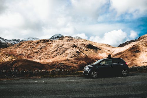 Black Vehicle Near Mountain