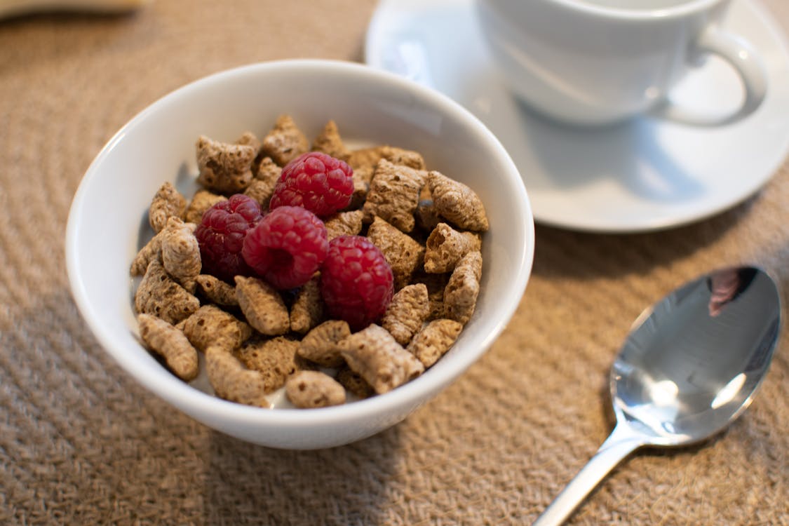 Bowl of Cereals with Raspberries 