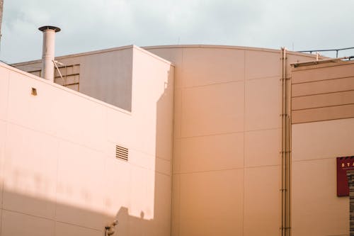 White Concrete Building Under Blue Sky