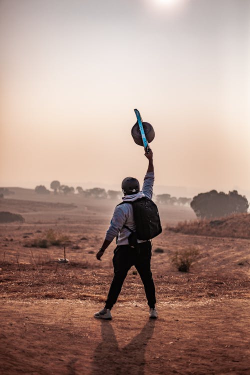 Man Holding Balance Board