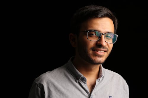 Man Wearing Eyeglasses And Polo Shirt