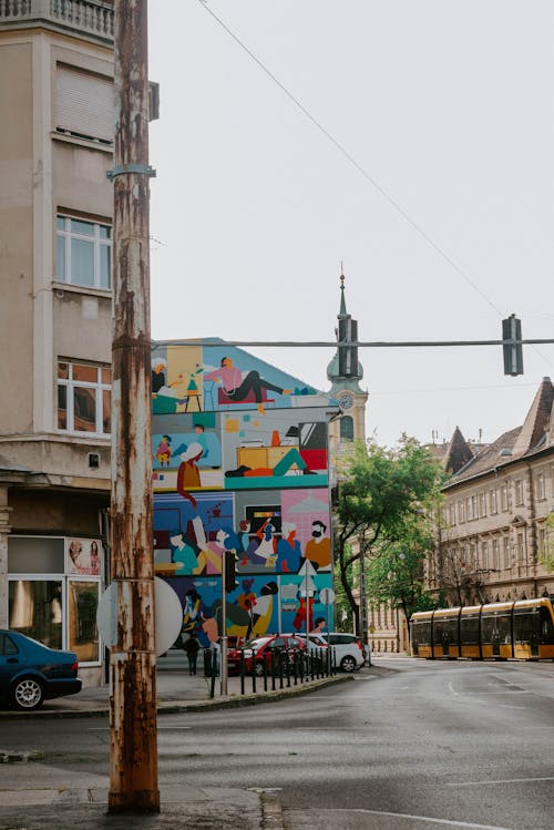 Foto profissional grátis de arte, bonde, edifícios