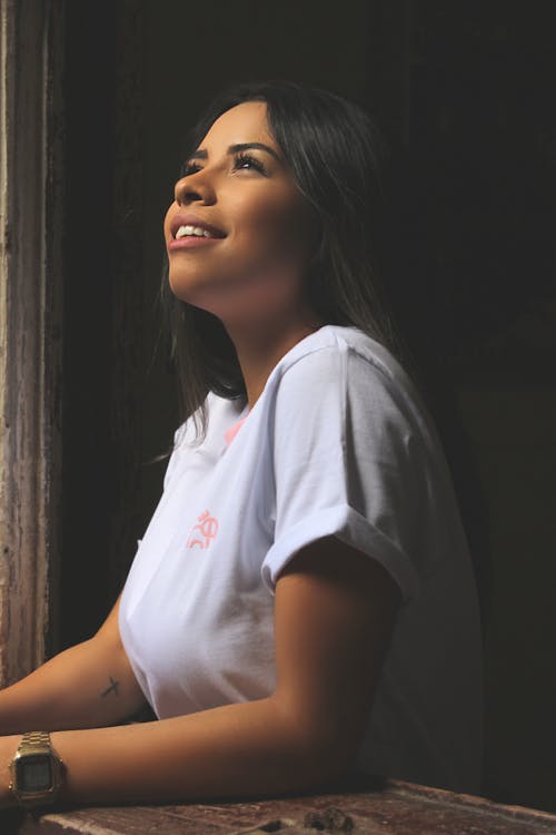 Woman Wearing White Crew Neck Shirt 