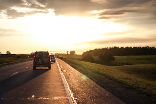 Free Photo of Vehicles On Road During Golden Hour Stock Photo