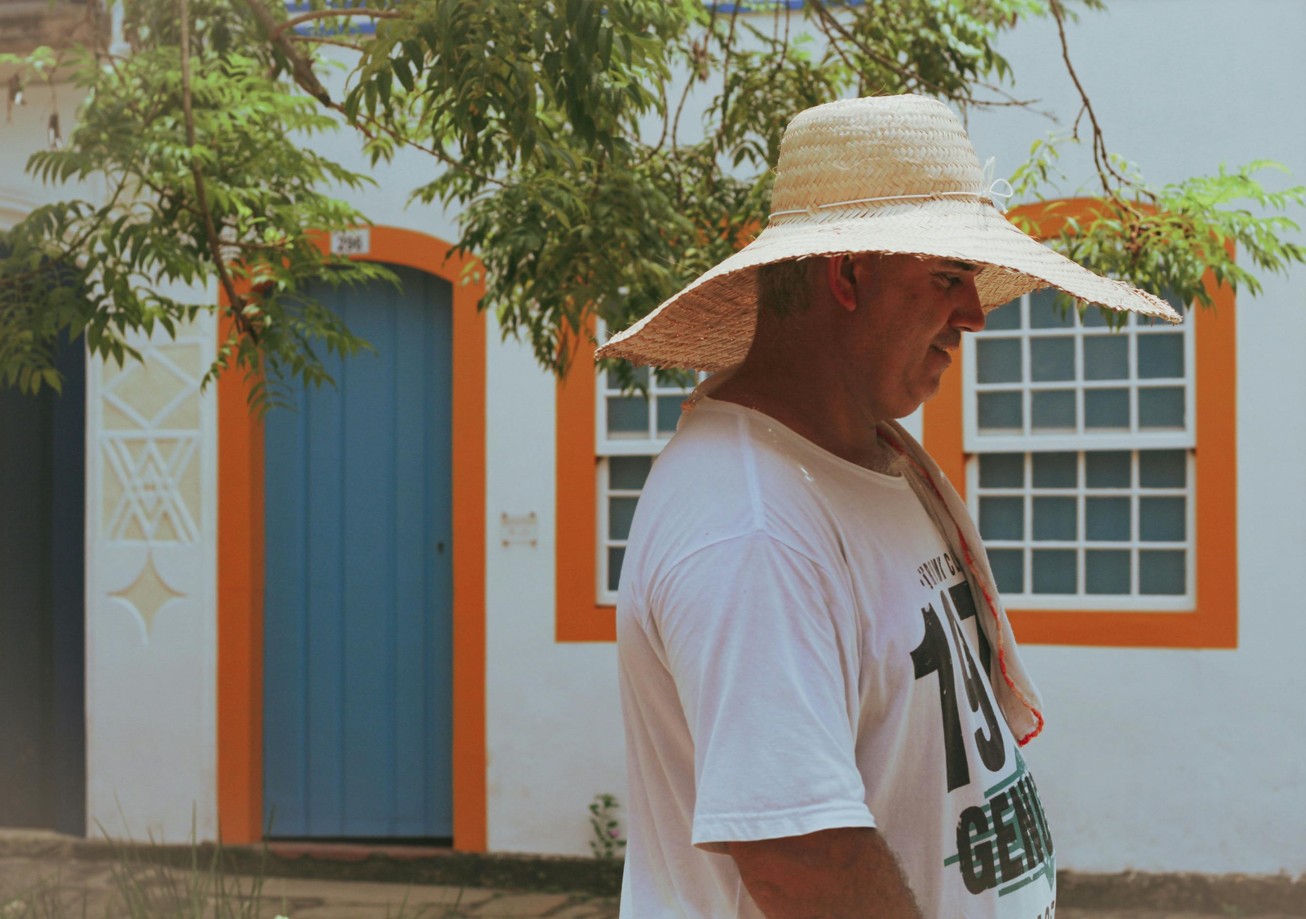 Photo of Man Wearing Straw Hat · Free Stock Photo