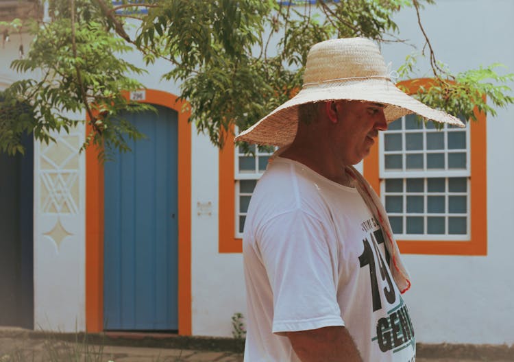 Photo Of Man Wearing Straw Hat