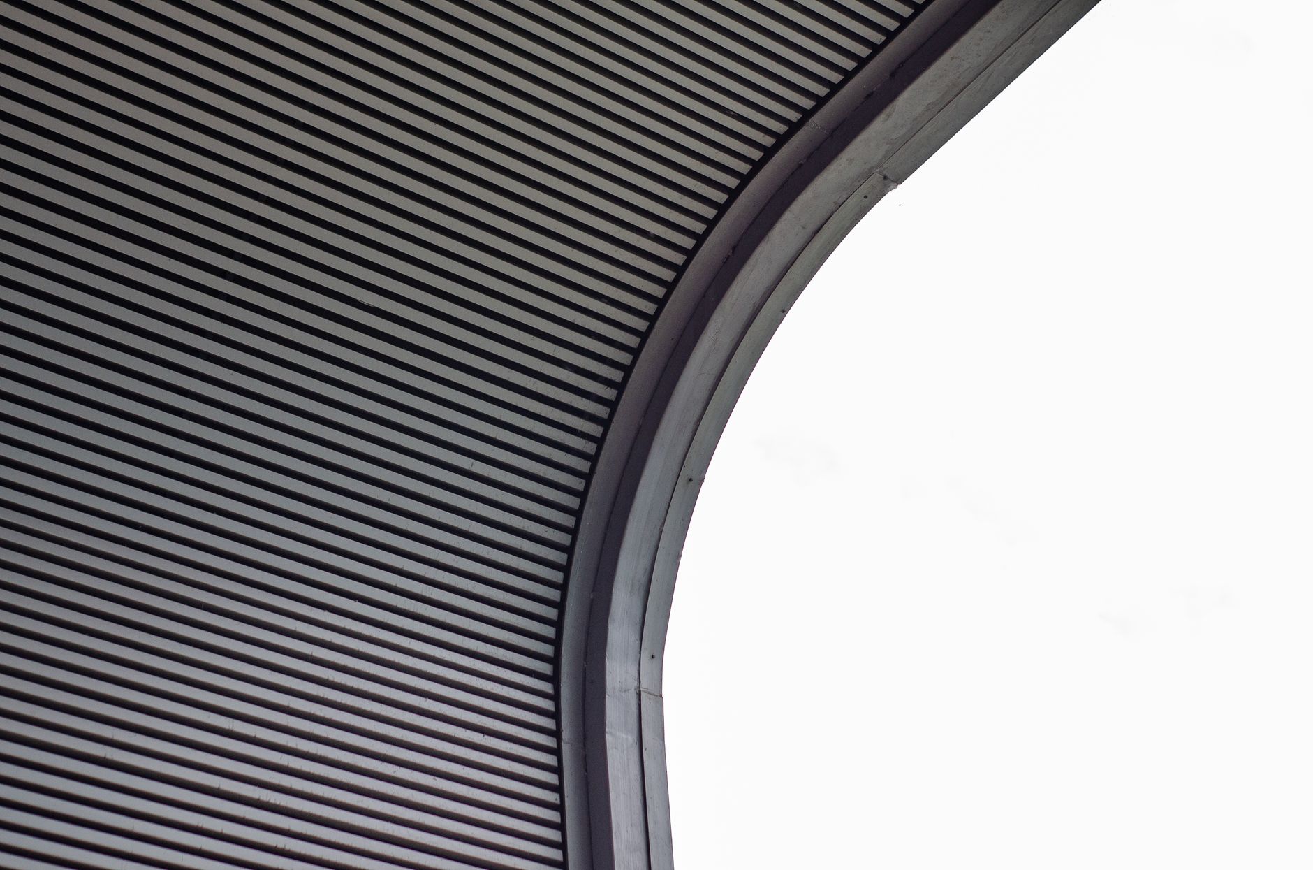 Close-up of modern metal architecture showcasing curved design in Belém, Brazil. Close-up of modern metal architecture showcasing curved design in Belém, Brazil.