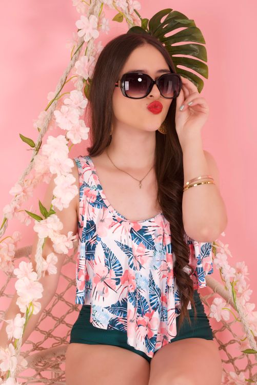 Portrait of a Woman with a Floral Top · Free Stock Photo
