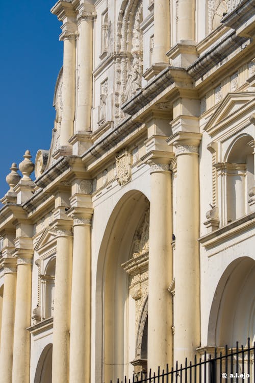 A large white building with ornate columns