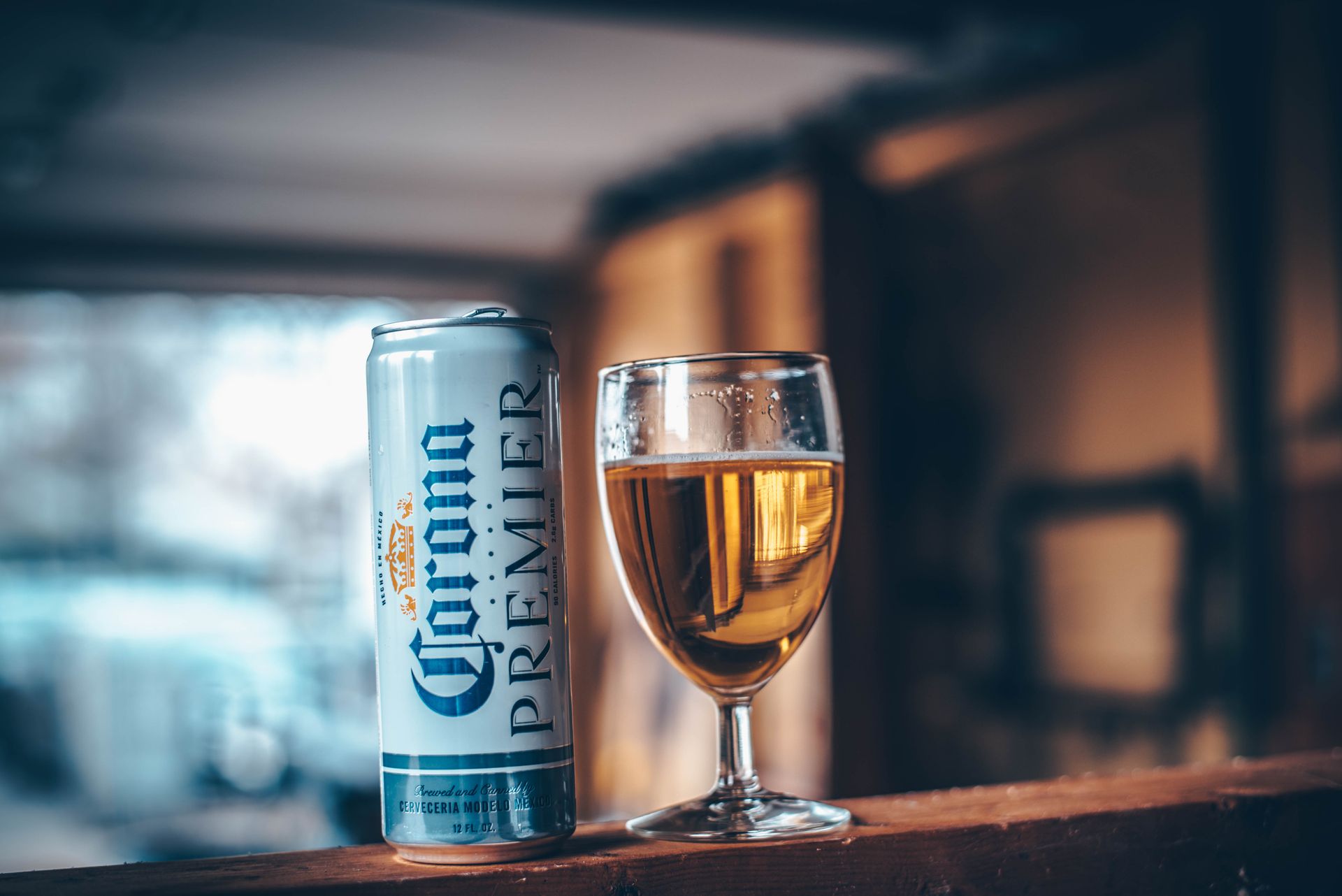 Corona Premier Beer Can Beside Goblet Glass