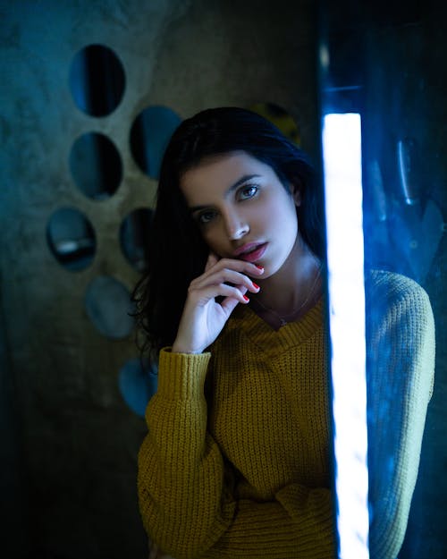 Photo of Girl Wearing Yellow Sweater