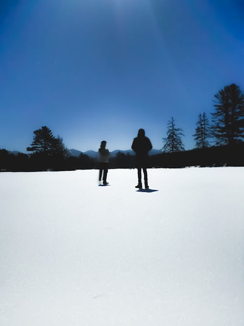 Бесплатное стоковое фото с замерзшее озеро, зима, красивое небо