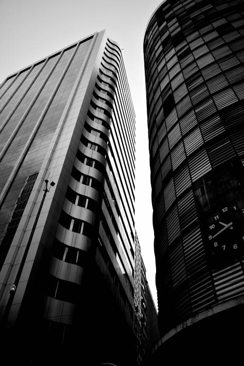 Free Black and white photo of two tall buildings Stock Photo