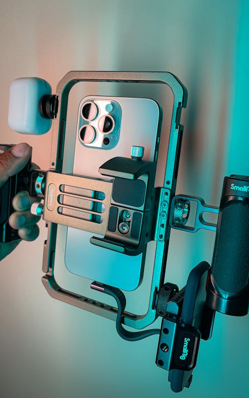 Mobile phone filming equipment.