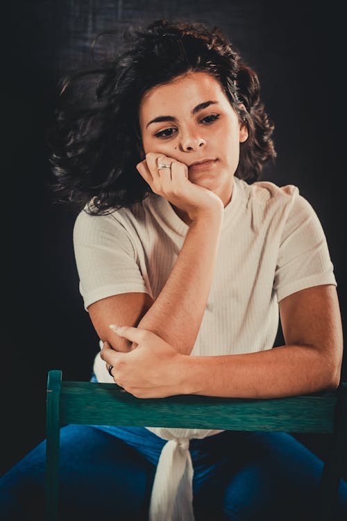 Free Woman Sitting On Chair Stock Photo