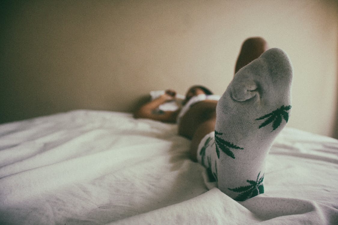 Close-Up Photo of Person Wearing Socks