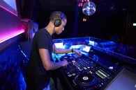 Man Wearing Black Crew-neck Shirt Playing Dj Turntable