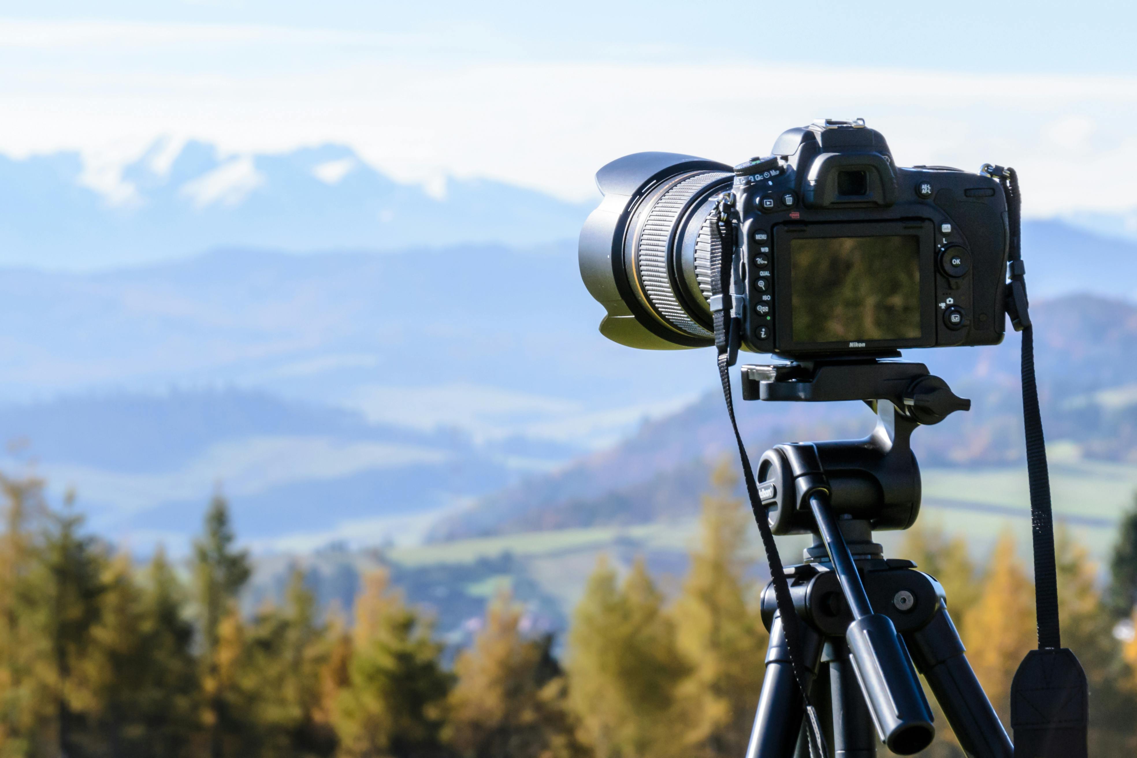 Download Mountain Photography With Black DSLR Camera Wallpaper | Wallpapers .com