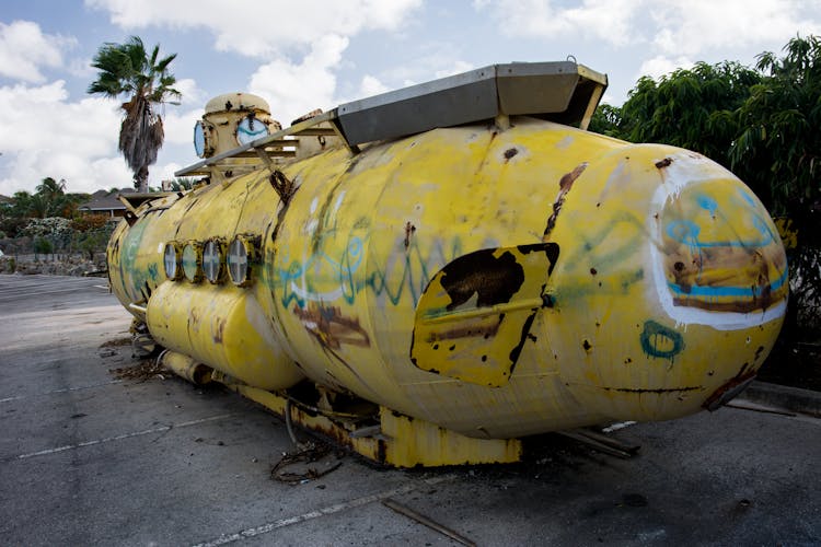 Yellow And Gray Submarine On Gray Pavement