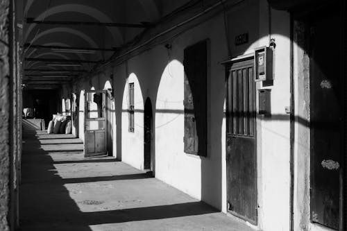 Black and white photograph of an alleyway